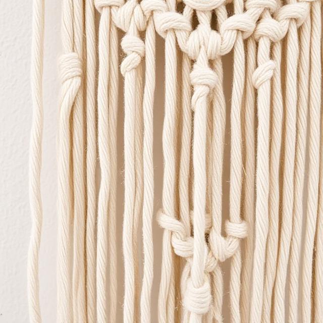 DIY macramé wall hanging handmade for Boho home décor.